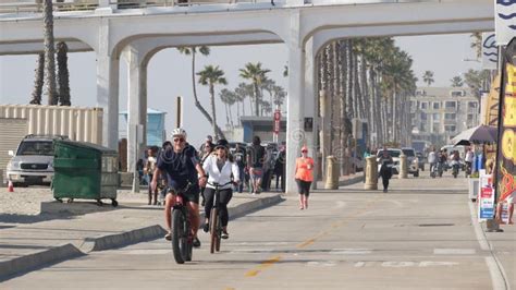 People Walking, Waterfront Promenade Beachfront Boardwalk. Ocean Beach Near Los Angeles ...