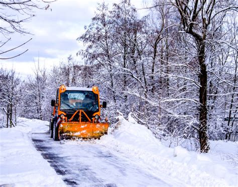 Tractor Plowing Snow Stock Photos, Pictures & Royalty-Free Images - iStock