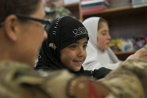 Outreach to teach: Volunteers connect with Afghan children > Air Force > Article Display