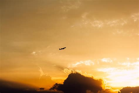 Silhouette of a plane during a sunset 1849883 Stock Photo at Vecteezy