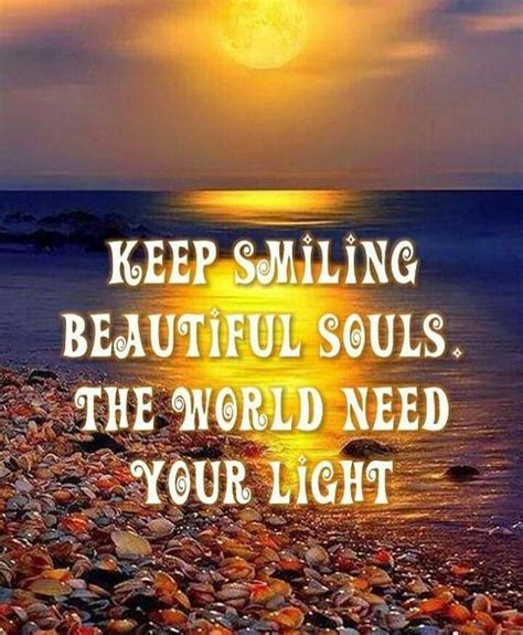 a quote on the beach that says keep smiling beautiful souls the world ...