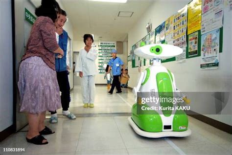 Japan Introduces First Hospital Robot Guide Photos and Premium High Res Pictures - Getty Images