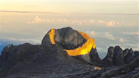 Sun Forms 'Golden Halo' On Mount Kinabalu Peak, Resembles A Gold Dragon ...