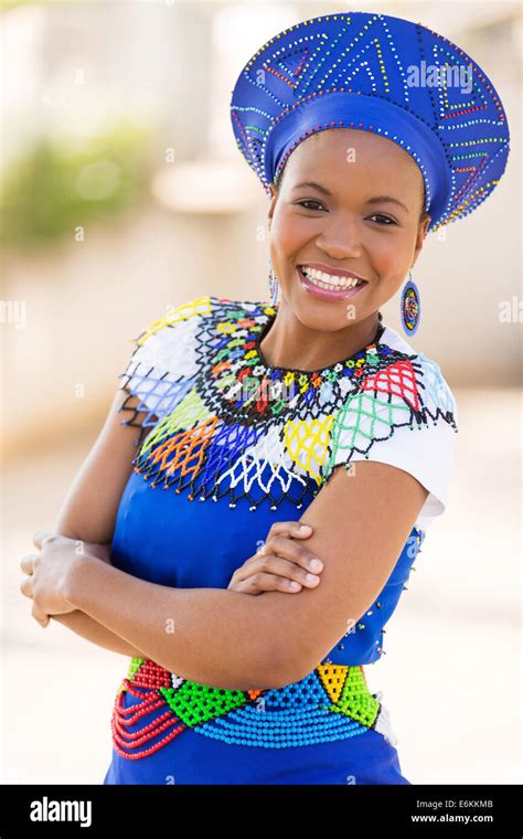 young south African Zulu woman in traditional clothes portrait outdoors ...