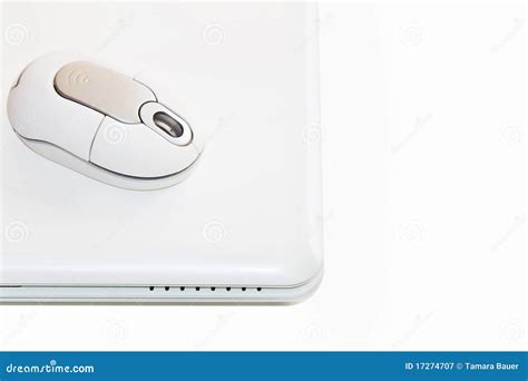 White Laptop with Cordless Mouse Stock Image - Image of instrument, silver: 17274707