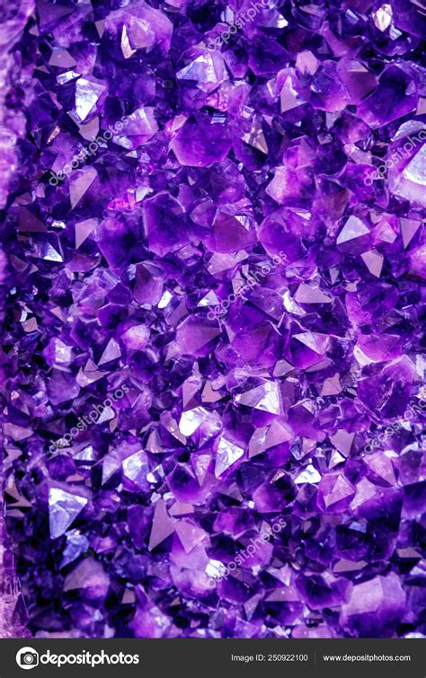 Amethyst purple crystal. Mineral crystals in the natural environment. Texture of precious and ...