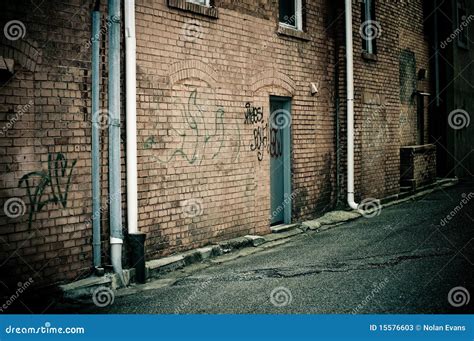 Graffiti On Old Brick Wall Stock Photos - Image: 15576603