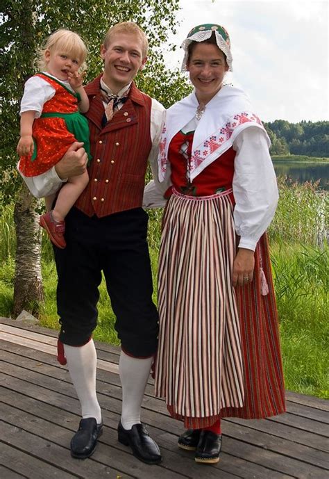 family wearing Swedish folk costume | Scandinavian costume, Traditional ...