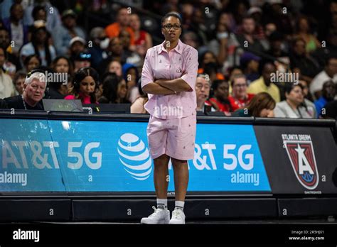 Atlanta Dream head coach Tanisha Wright works during a WNBA basketball game against the Las ...