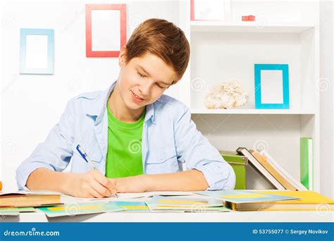 Smart Handsome Boy Write In Textbook, Do Homework Stock Photo - Image: 53755077