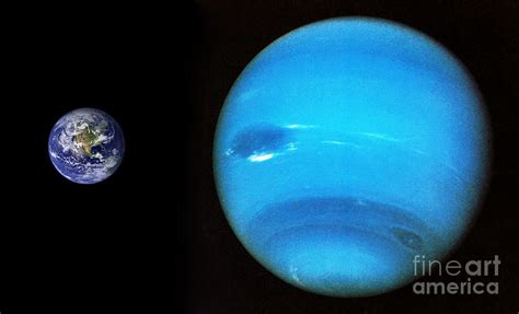 Earth And Neptune Photograph by Science Source