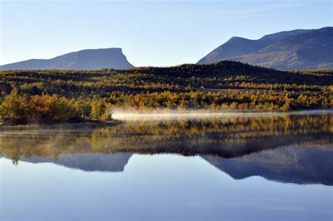 Calm lake reflection stock photo. Image of reflected - 16068372