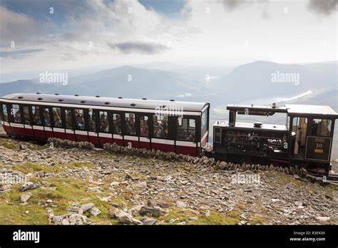 Snowdon Mountain Railway train, summit of Snowdon, Snowdonia National Park, Gwynedd, Wales, UK ...