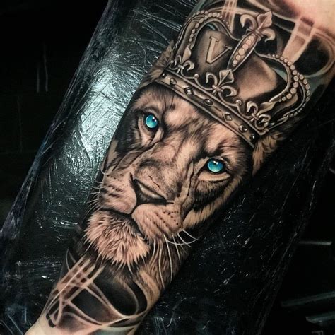 Amazing blue turquoise eyes lion crown tattoo by awesome artist Cebaz ...