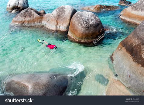 A Man Snorkeling At The Baths On Virgin Gorda In The British Virgin ...