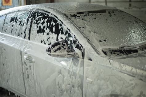 Foam on the Car Body. Car Wash in Detail Stock Photo - Image of vertical, city: 303394796