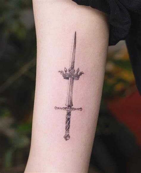 Sword and crown by tattooist Franky - Tattoogrid.net