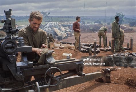 A United State Military officer maintains an M101 howitzer artillery... News Photo - Getty Images