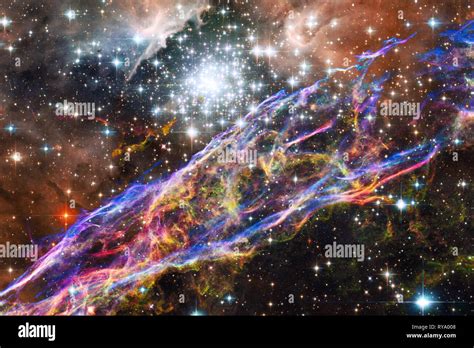 Cosmic galaxy background with nebulae, stardust and bright stars. Elements of this image ...