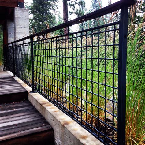 Martis Camp home with 4"mesh x 3/8"ga woven wire with a 1/2"x1"x1/8" "C" Channel frame with a ...