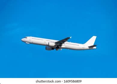 Passenger Plane Taking Off Into Blue Stock Photo 1609586809 | Shutterstock