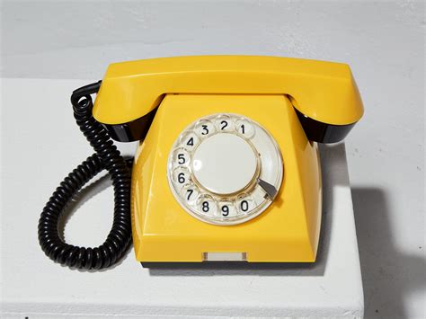 TE057 Canary Yellow Rotary Phone Prop Rental | ACME Brooklyn