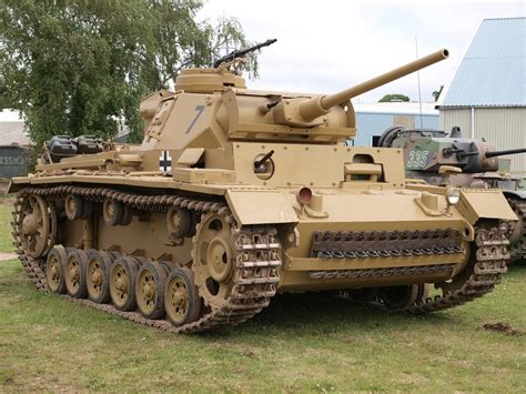 Panzer III painted in desert camouflage and up armed with a high ...