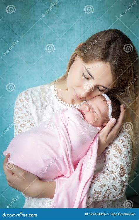 Portrait of Mother Hugging Her Newborn Baby Girl Stock Photo - Image of gentle, newborn: 124154426