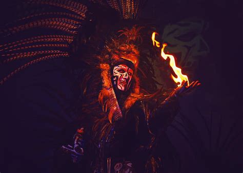 Person Wearing a Costume with Fire on Hand · Free Stock Photo