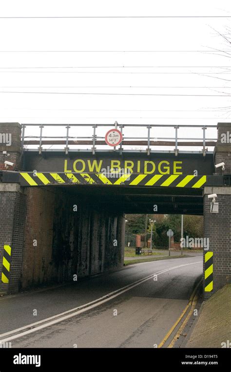 low bridge bridges sign signs road rail height restriction uk Stock Photo - Alamy