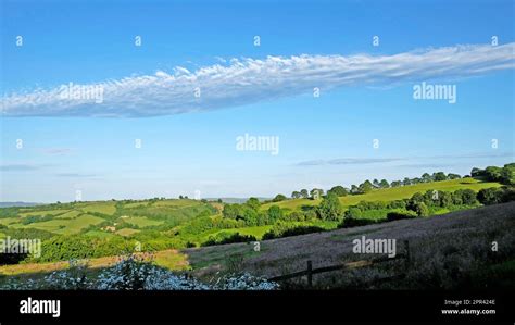 Long altostratus or stratus cloud formation stretching across the sky ...