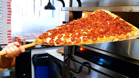 American Food - The BIGGEST PIZZA SLICE in the world! Pizza Barn New York - YouTube