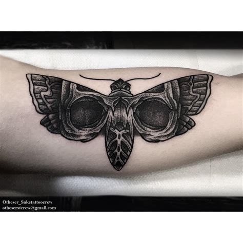 Wonderful Black Moth on Arm - Best Tattoo Ideas Gallery