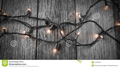 White Christmas Tree Lights on Rustic Wood Background Stock Image - Image of barn, seasonal ...