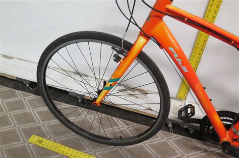 Fuji Bikes 17" Absolute two.3 Orange Hybrid Bike - Oahu Auctions