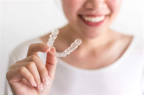 Caring for Your Retainer: 8 Invisalign Cleaning Tips - Alicia Dental