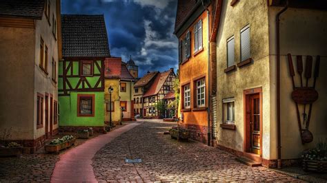 Charming European Village: A Stunning HD Wallpaper of Man-Made Architecture