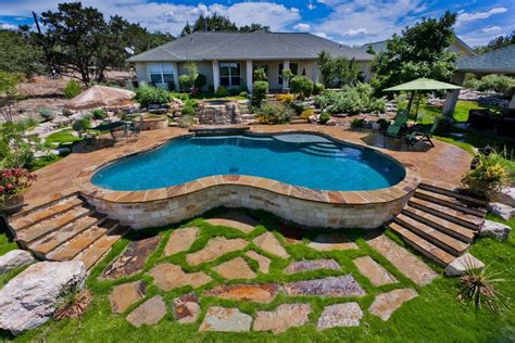 flagstone pool deck traditional with disappearing edge transitional outdoor umbrellas | Above ...