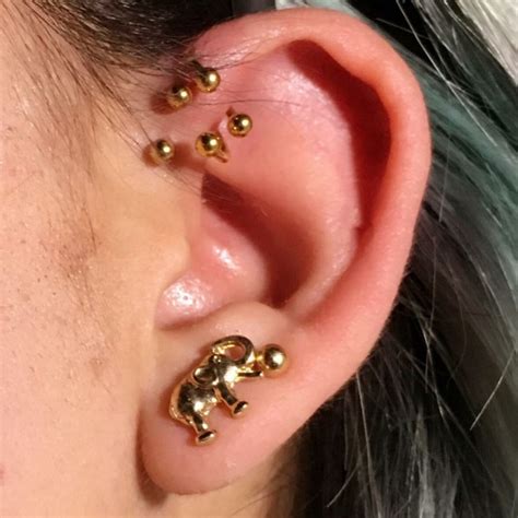 Forward Helix Piercing [50 Ideas]: Pain Level, Healing Time, Cost, Experience - Piercee