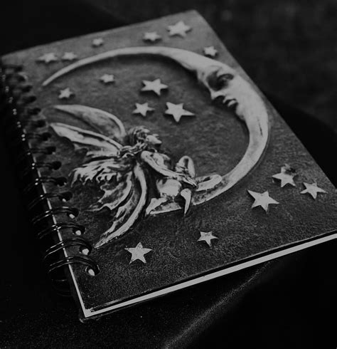 HD wallpaper: black and gray notebook with embossed crescent moon and ...