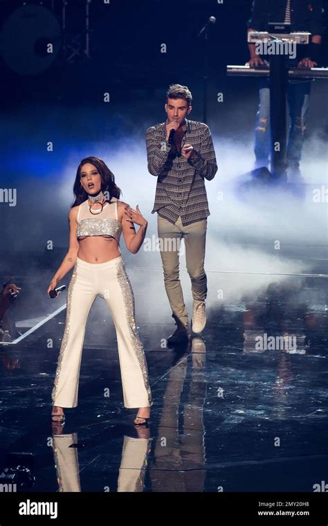 Andrew Taggart of The Chainsmokers, right, and Halsey perform at the MTV Video Music Awards at ...