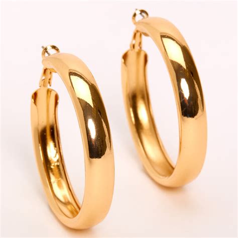 Gold 50MM Tube Hoop Earrings | Claire's