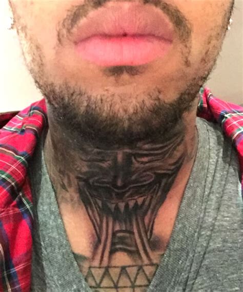 Chris Brown Covers Up Fierce Lion Throat Tat With Devil Face Ink- PopStarTats