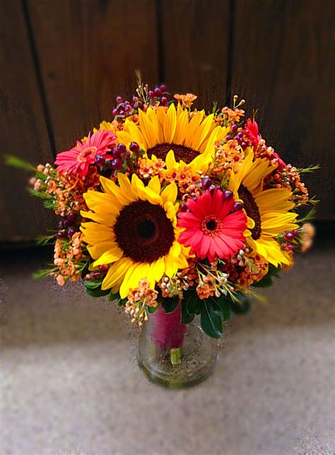 Fall bridal bouquet with sunflowers, gerber daisies, wax flower and ...