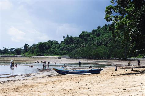 Sorong, Indonesia 2021- People on the beach 3363922 Stock Photo at Vecteezy