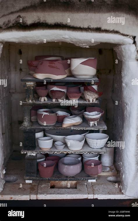 Kiln in Potter's workshop with pottery. Electric oven for ceramic clay ...