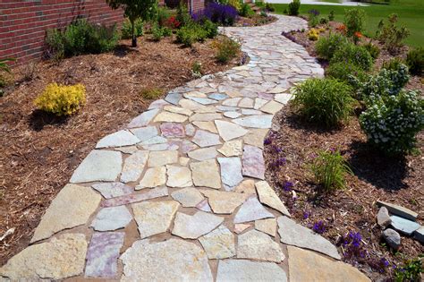 How to Create a Walkway With Pavers on a Grade