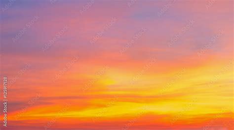 Bright orange and yellow colors dramatic sunset sky,sunrise sky,soft focus Stock Photo | Adobe Stock