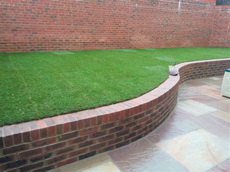 Low retaining stock brick wall in Uckfield Garden Retaining Wall, Landscaping Retaining Walls ...