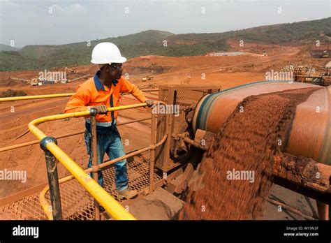 Mining operations for transporting & managing iron ore. Fines ore on conveyor belt to stacker ...